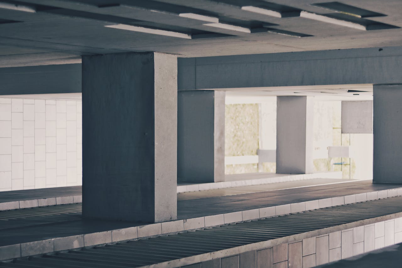 services-02 A contemporary multi-storey building showcasing minimalist architecture with ample natural light in Pinang, Indonesia.